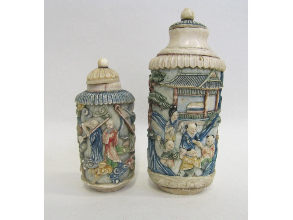 Appraisal: Two Chinese carved ivory snuff bottles