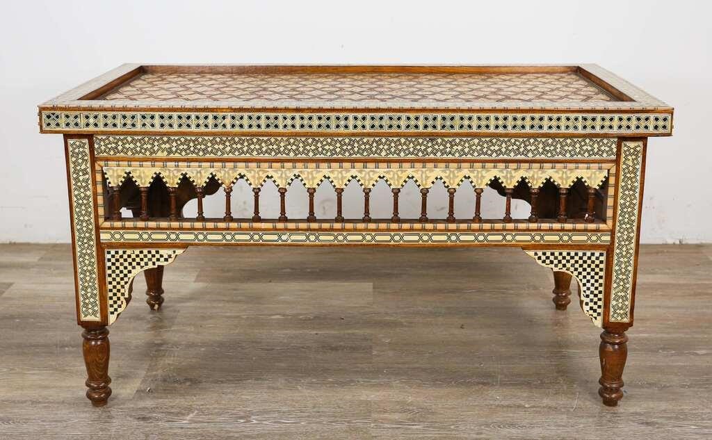 Appraisal: Moorish style inlaid cocktail table Egyptian th Century Geometric inlays