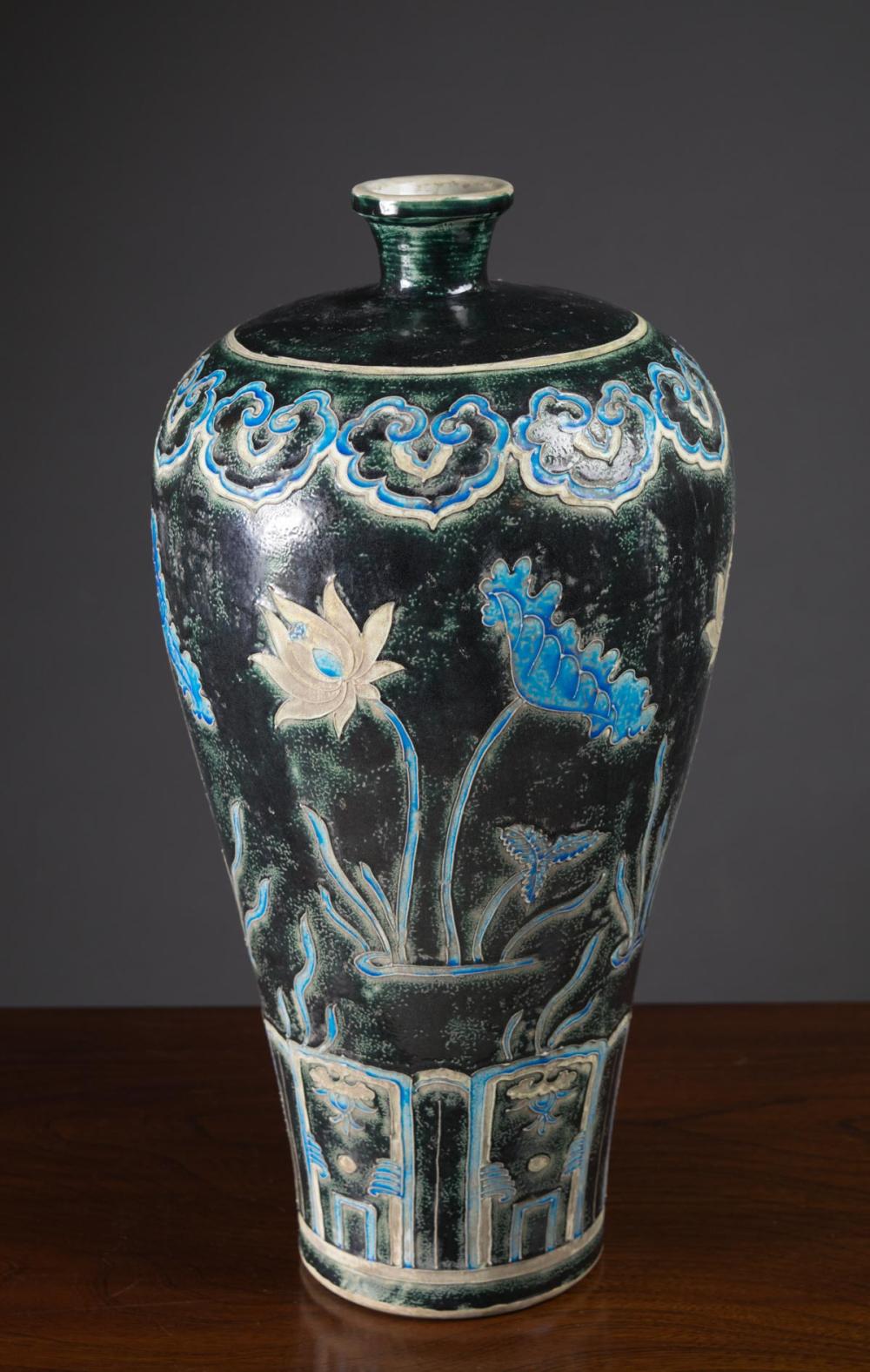 Appraisal: CHINESE PORCELAIN FAHUA VASE of meiping form featuring a lotus