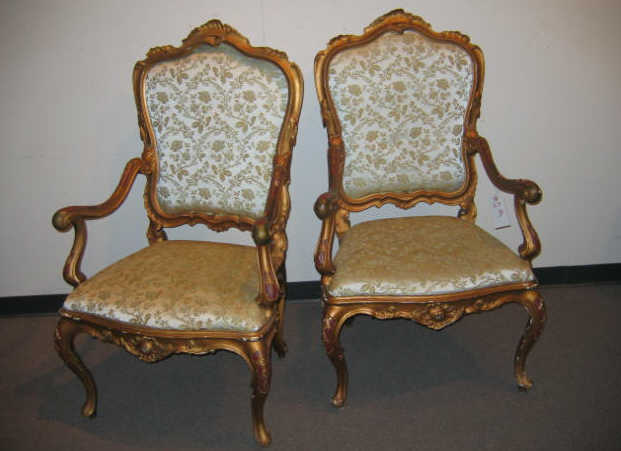 Appraisal: PAIR LOUIS XV STYLE GILT WOOD ARMCHAIRS Shield form high