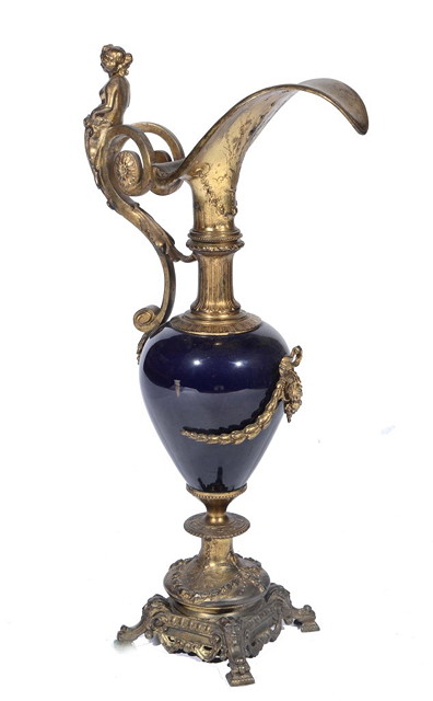 Appraisal: A FRENCH BLUE CERAMIC EWER with gilt cast decoration in