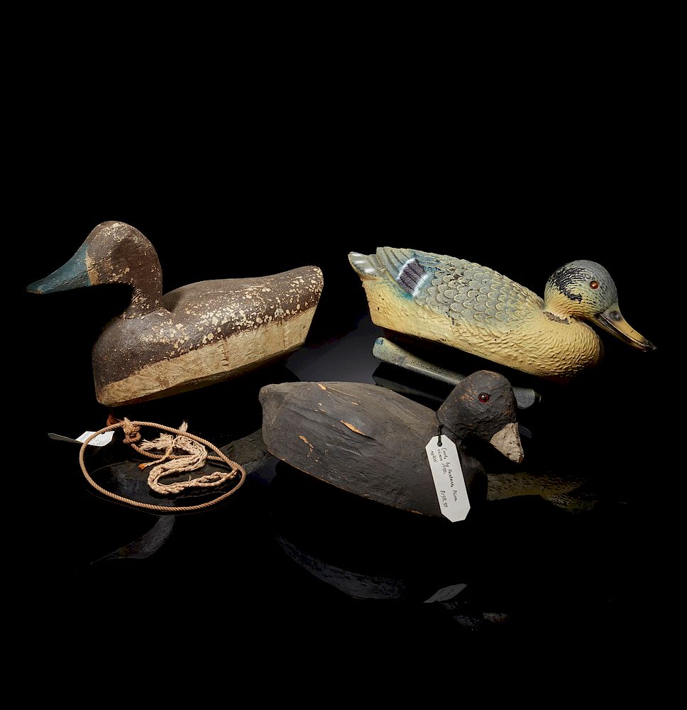 Appraisal: Three Duck Decoys Lot of three duck decoys comprising a