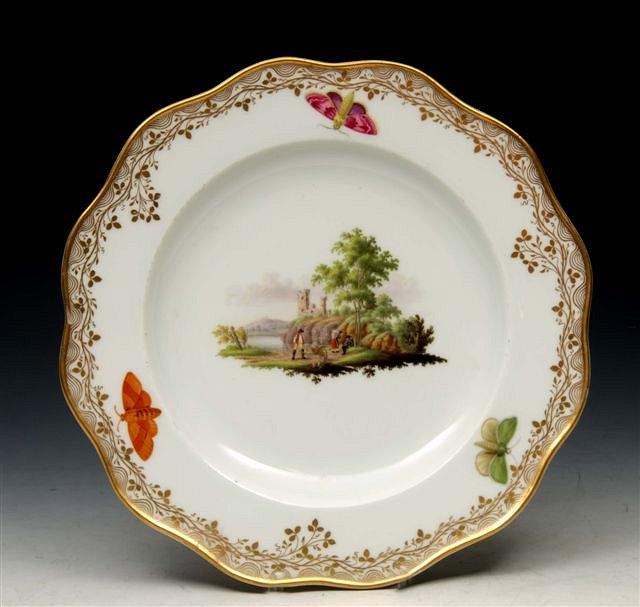 Appraisal: A MEISSEN WHITE GROUND PORCELAIN PLATE the centre painted with