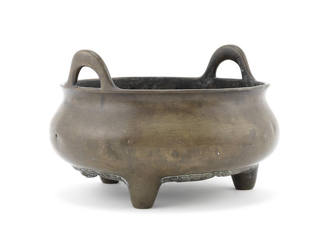 Appraisal: A large bronze tripod incense burner Xuande six-character mark Qing