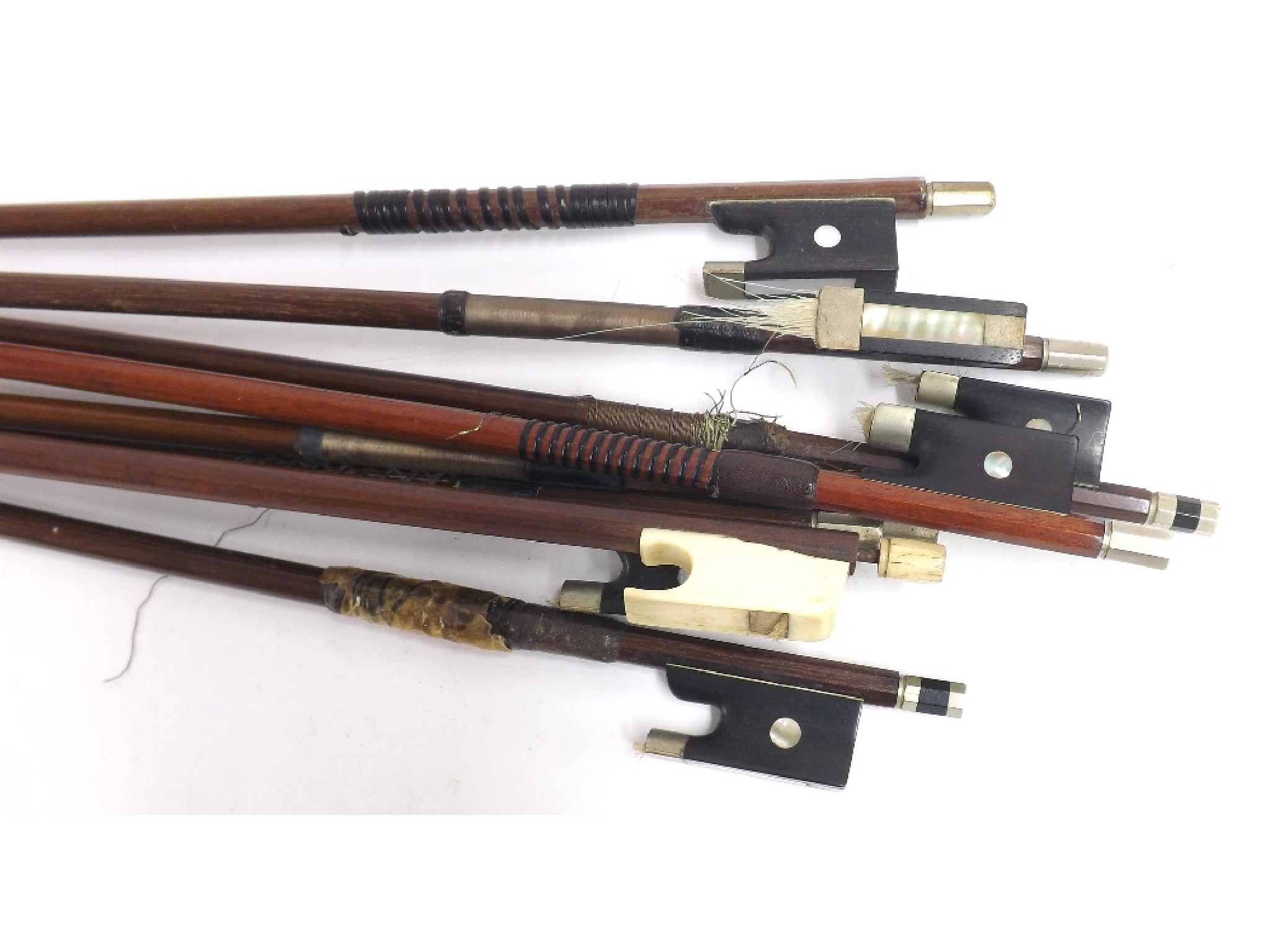 Appraisal: Two nickel mounted violin bows one stamped H Fleury and