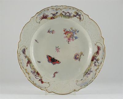 Appraisal: A Chelsea plate painted in the 'Warren Hastings' pattern with