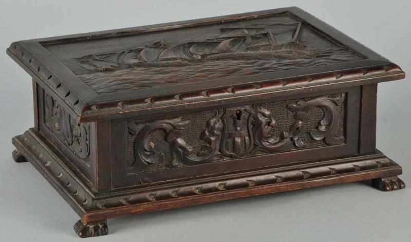 Appraisal: Carved Columbus Cuban Humidor Description s Fantastic workmanship commemorating the