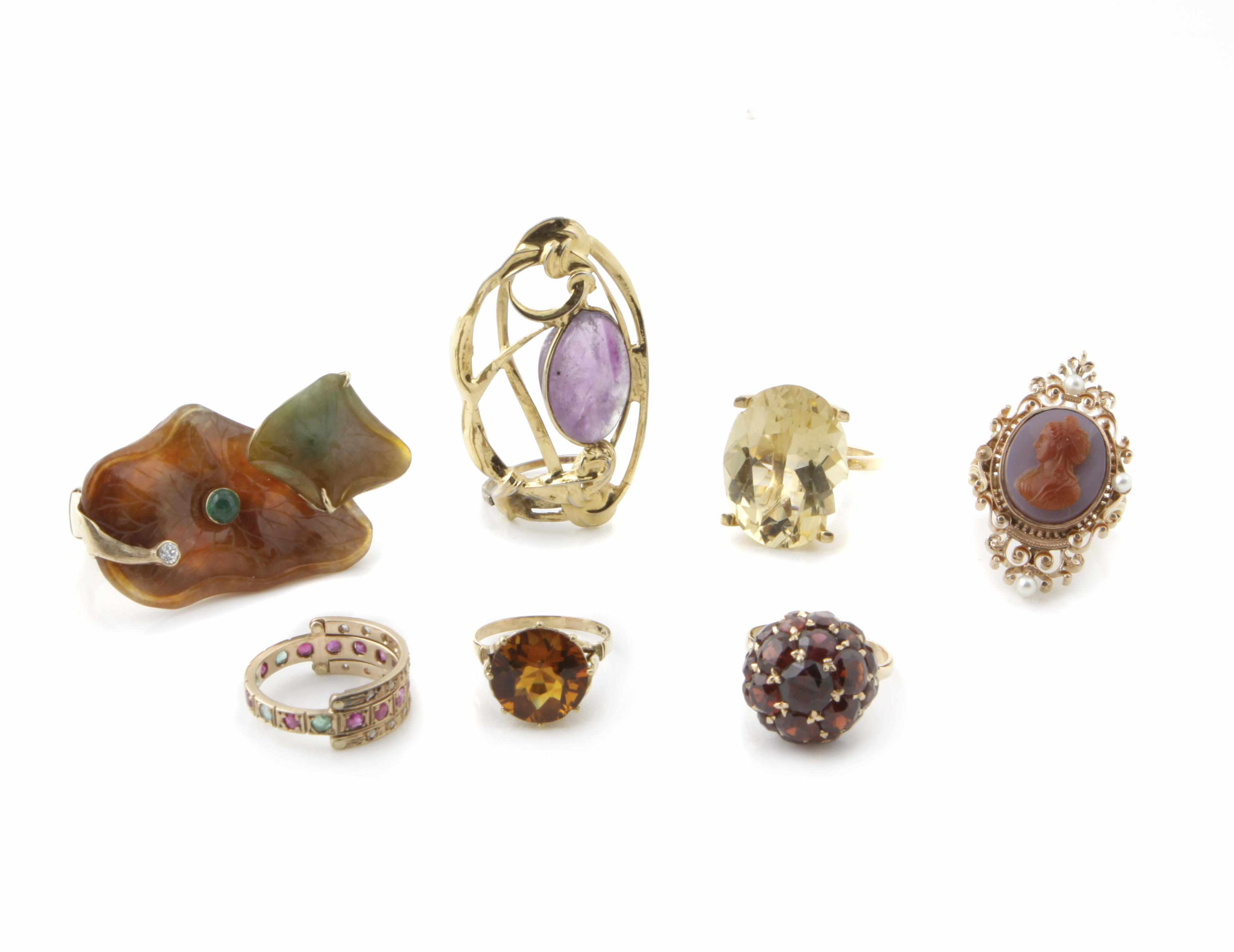 Appraisal: A group of gem-set hardstone metal and gold rings g