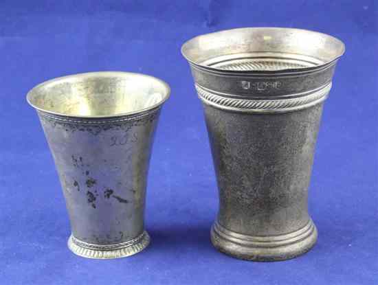 Appraisal: An Edwardian silver beaker with flared rim and wrythen band