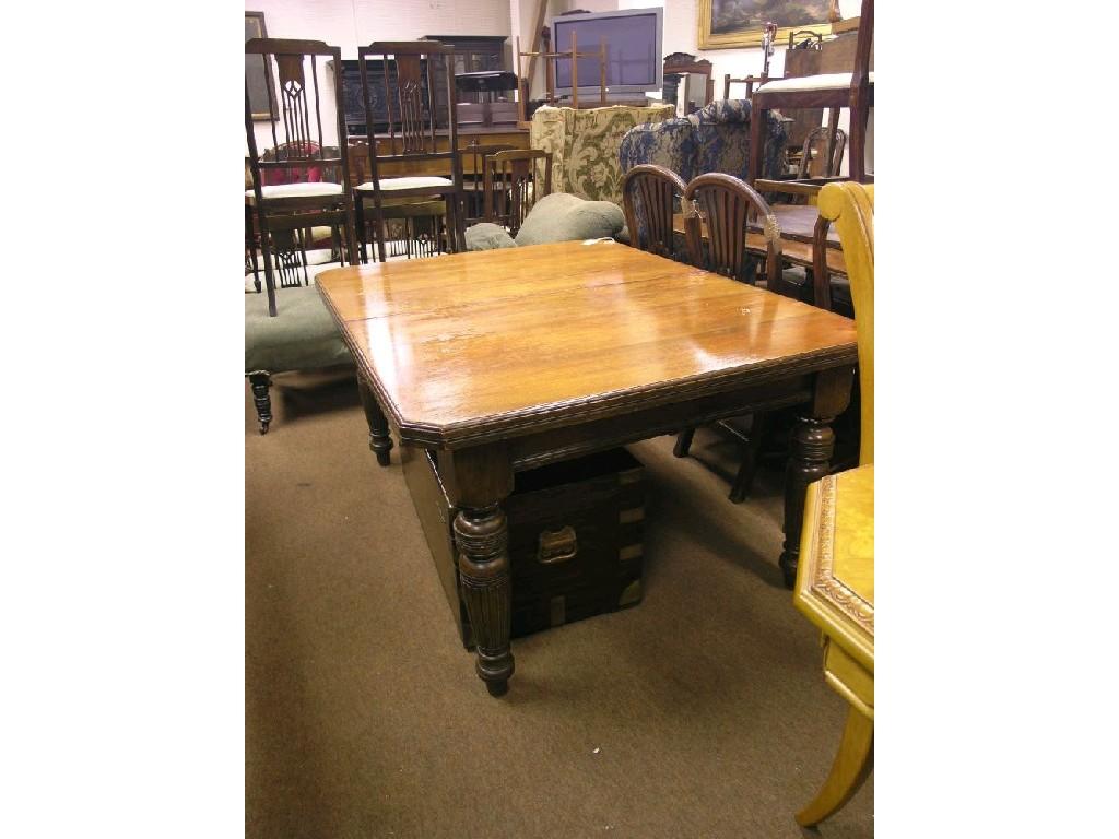 Appraisal: A Victorian walnut wind-action dining table on turned and reeded