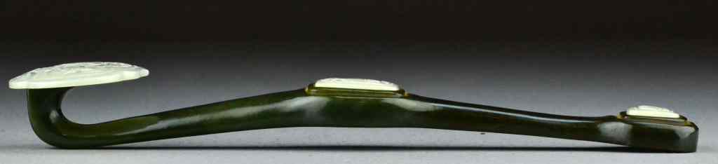 Appraisal: Chinese Jade Ruyi ScepterThe scepter carved from dark green jade