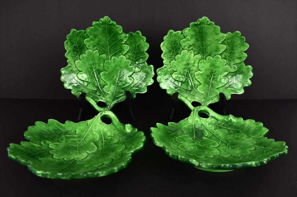 Appraisal: FOUR ITALIAN MAJOLICA LEAF DISHESModern With green glaze and molded