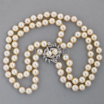 Appraisal: DOUBLE STRAND PEARL AND DIAMOND NECKLACE ca Two concentric strands