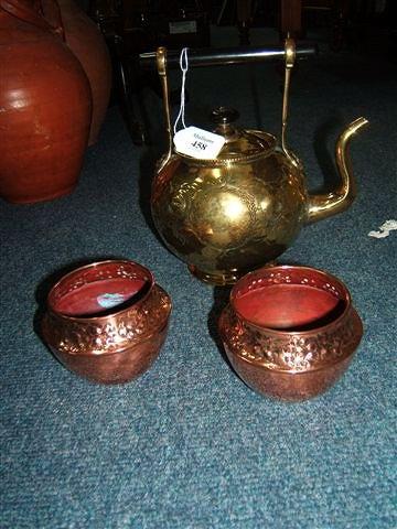 Appraisal: A Victorian brass kettle with Christopher Dresser style handle and