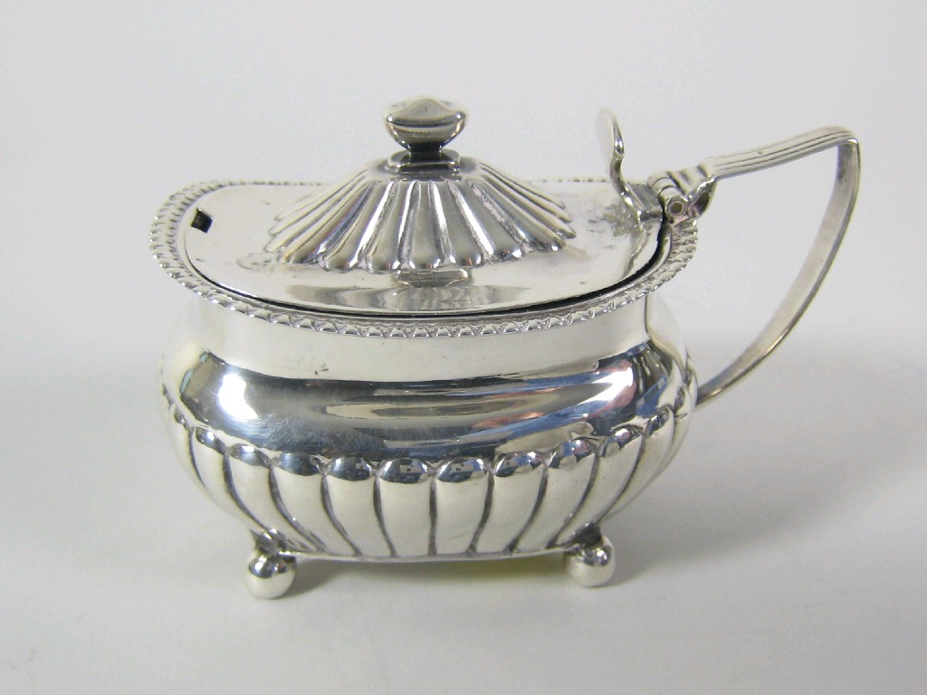 Appraisal: A George III semi-fluted boat shape Mustard Pot with hinged