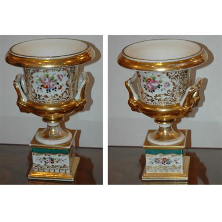 Appraisal: Pair of Paris Floral and Gilt Decorated Porcelain Urns on