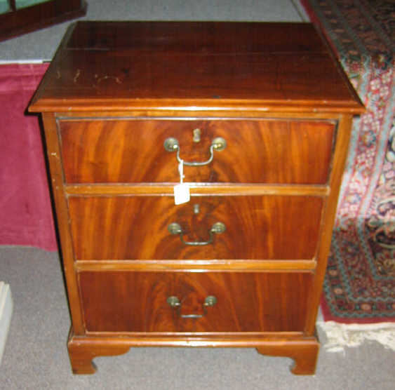 Appraisal: PAIR ENGLISH TH CENTURY BACHELOR'S CHESTS Mahogany with rectangular molded