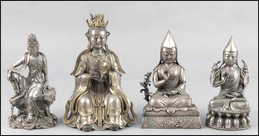 Appraisal: PARCEL GILT SILVERED METAL SEATED FIGURE Together with three silvered