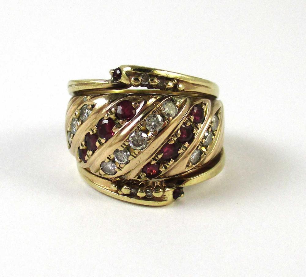 Appraisal: RUBY DIAMOND AND FOURTEEN KARAT GOLD RING The wide k