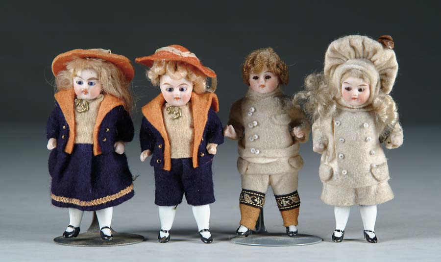 Appraisal: LOT OF FOUR SMALL ALL-BISQUE DOLLS All four dolls are