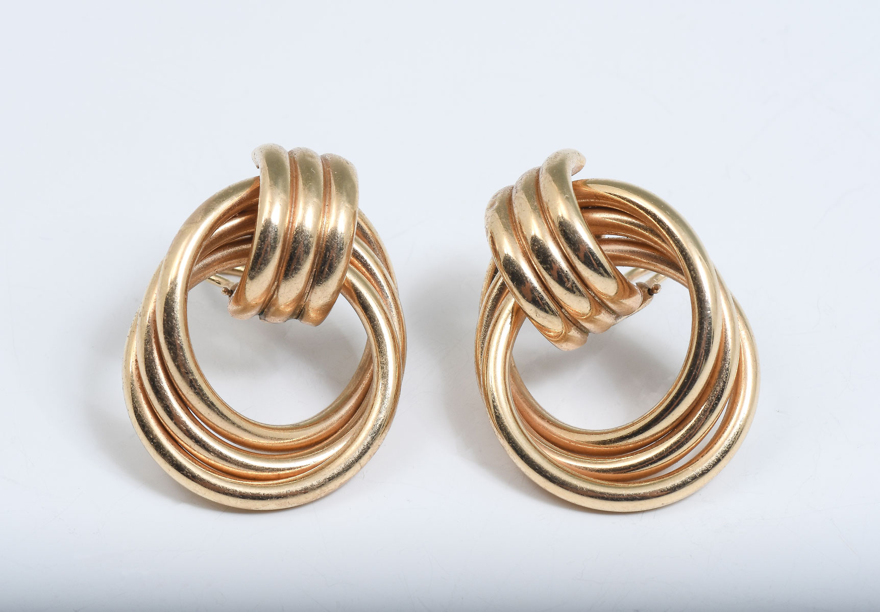 Appraisal: K KNOT STYLE EARRINGS K yellow gold knot style omega