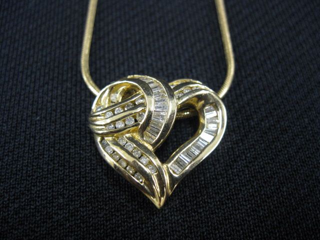 Appraisal: Diamond Heart Pendant diamonds round baguette totaling carrat in k