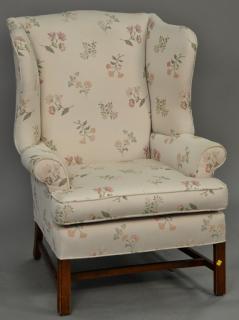 Appraisal: Chippendale style upholstered wing chair Chippendale style upholstered wing chair