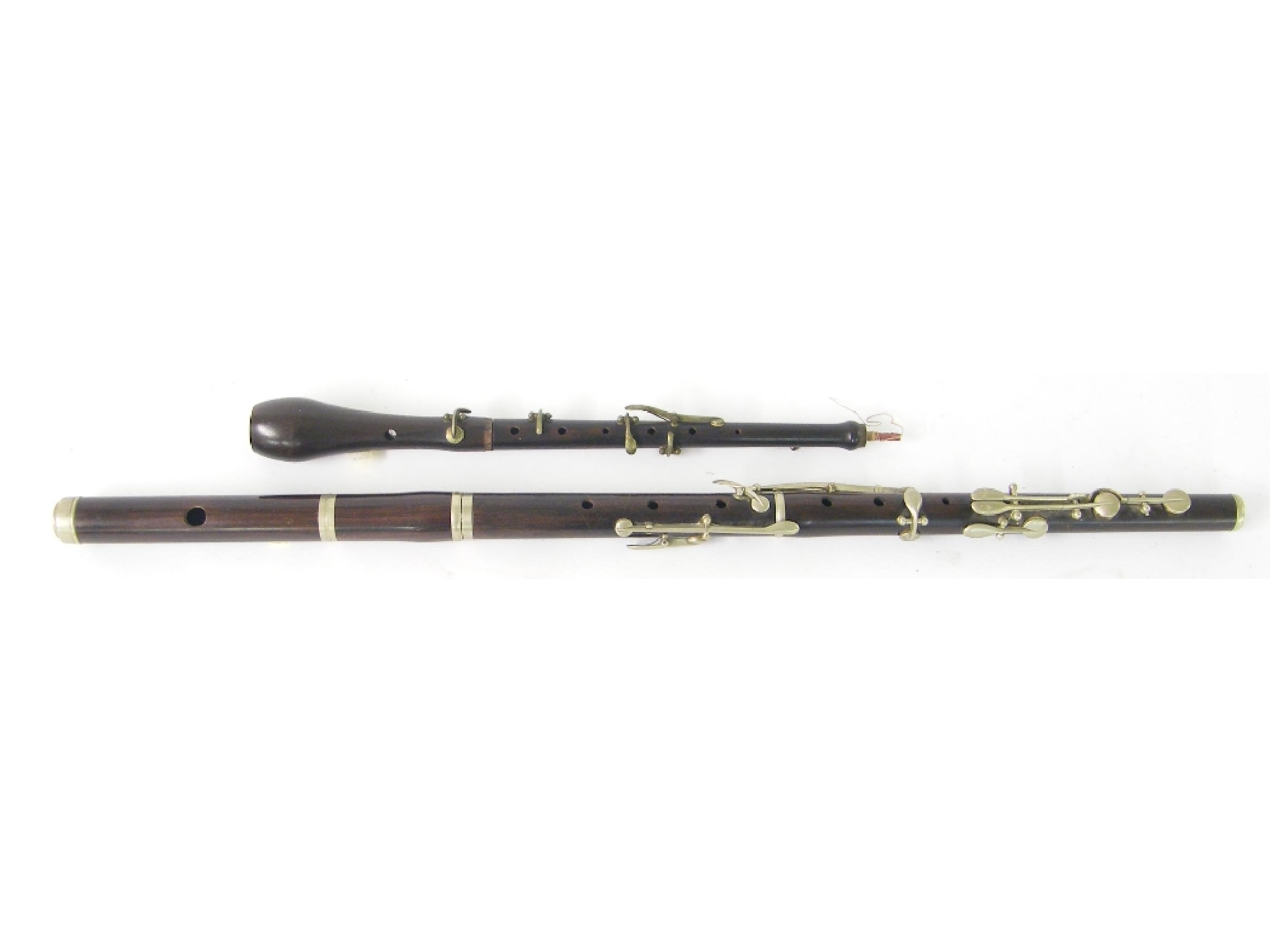 Appraisal: Rosewood and nickel mounted eight keyed flute unstamped together with