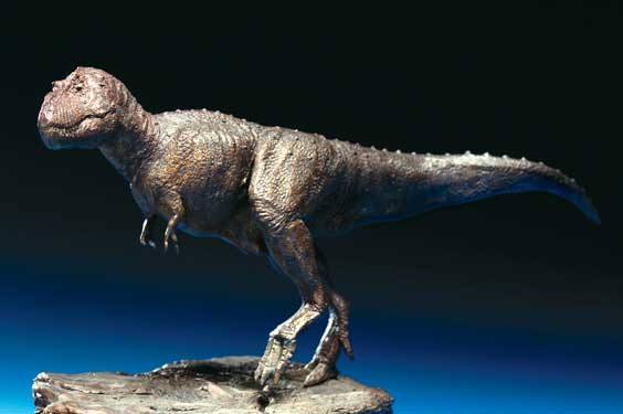 Appraisal: TYRANNOSAURUS BRONZE SCULPTURE Artist Charles McGrady This life-like Tyrannosaurs rex