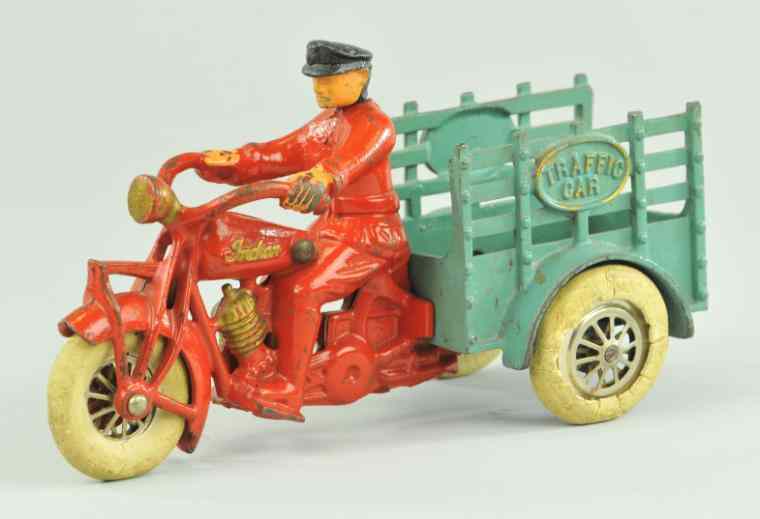 Appraisal: HUBLEY TRAFFIC CAR Swivel head driver painted in red cycle