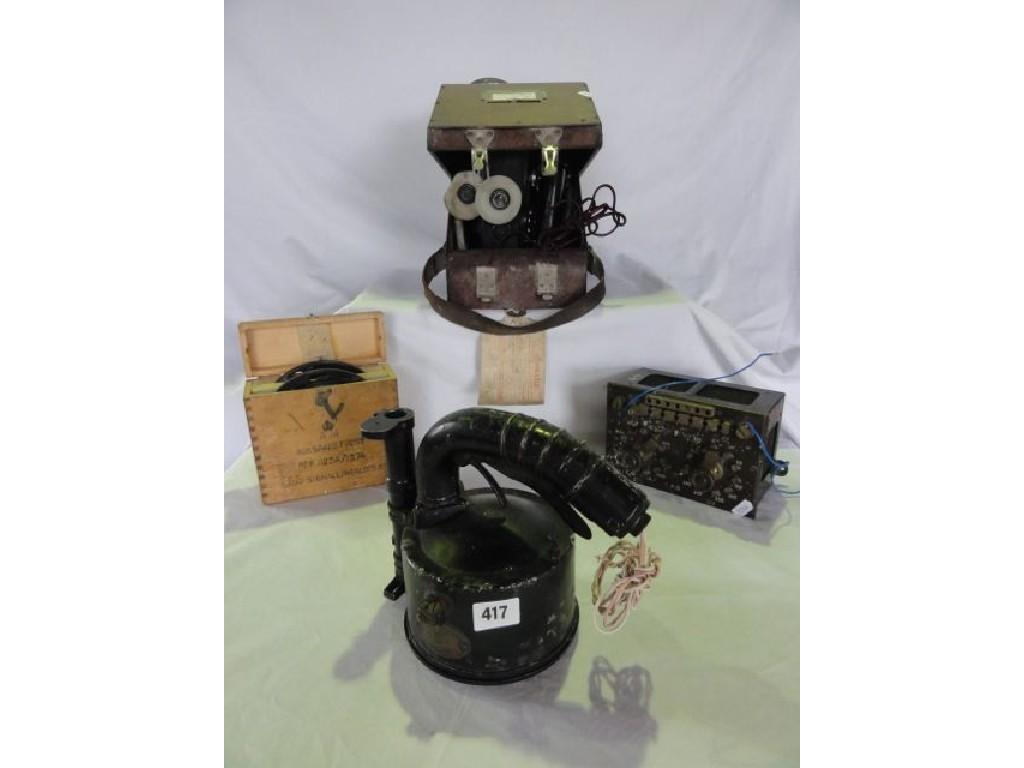 Appraisal: An ex-military signalling lamp by Aldis a bubble sextant and