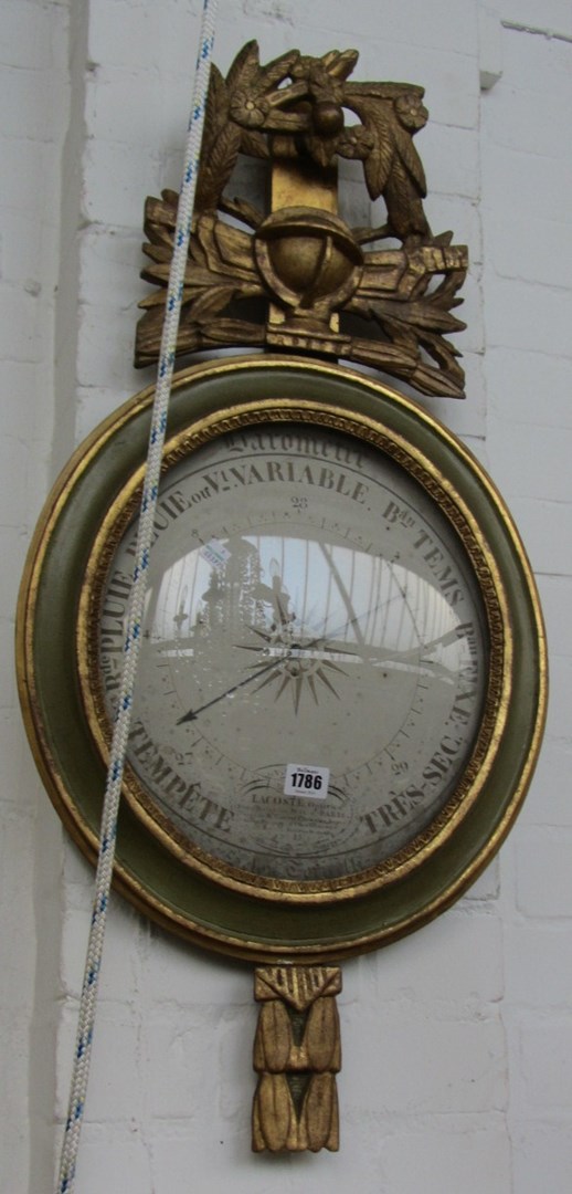 Appraisal: A French giltwood carved wall barometer late th Century to