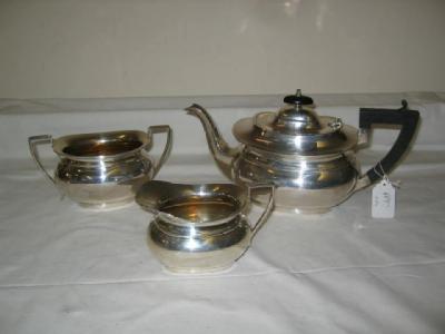 Appraisal: A THREE PIECE TEA SET of rounded oblong form the