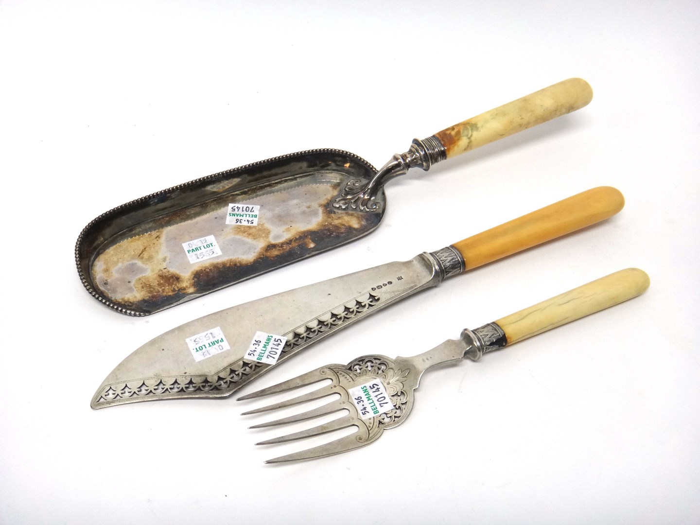 Appraisal: A pair of Victorian silver fish servers with pierced and