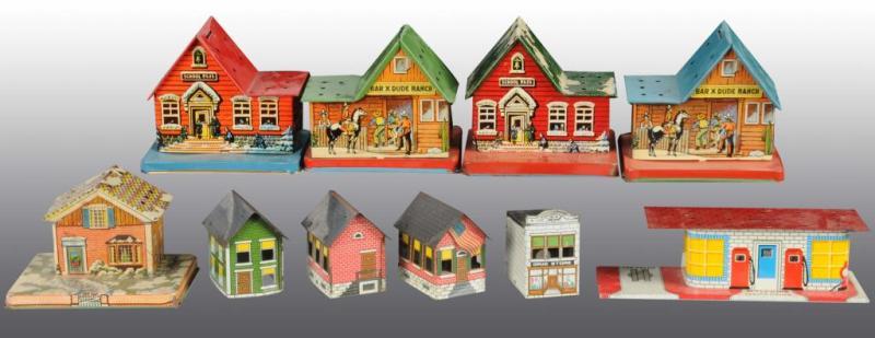 Appraisal: Lot of Tin Candy Container Banks Description Buildings include two