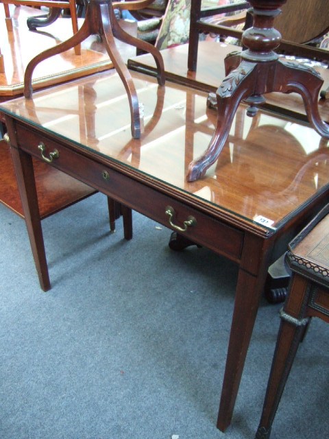 Appraisal: A th century mahogany side table the rectangular top over