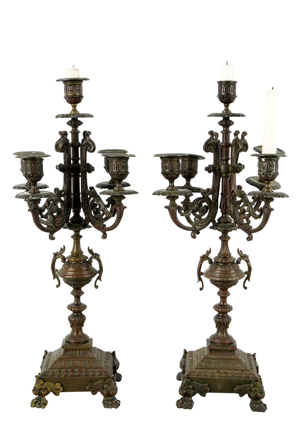 Appraisal: PAIR OF BRONZE CANDELABRAfive-light Condition with wax residue throughout inches