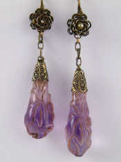 Appraisal: A pair of Chinese carved amethyst drop earrings purchased in