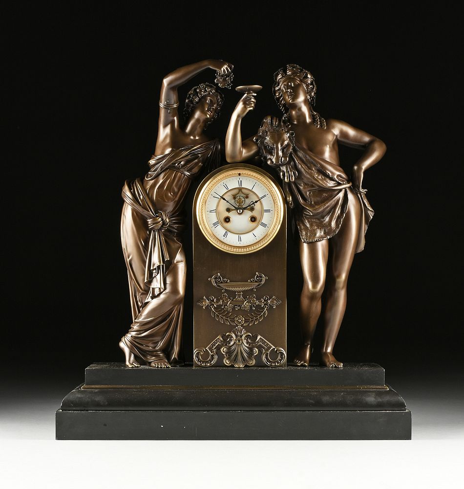 Appraisal: A NEOCLASSICAL REVIVAL PATINATED BRONZE AND BLACK MARBLE BACCHUS AND