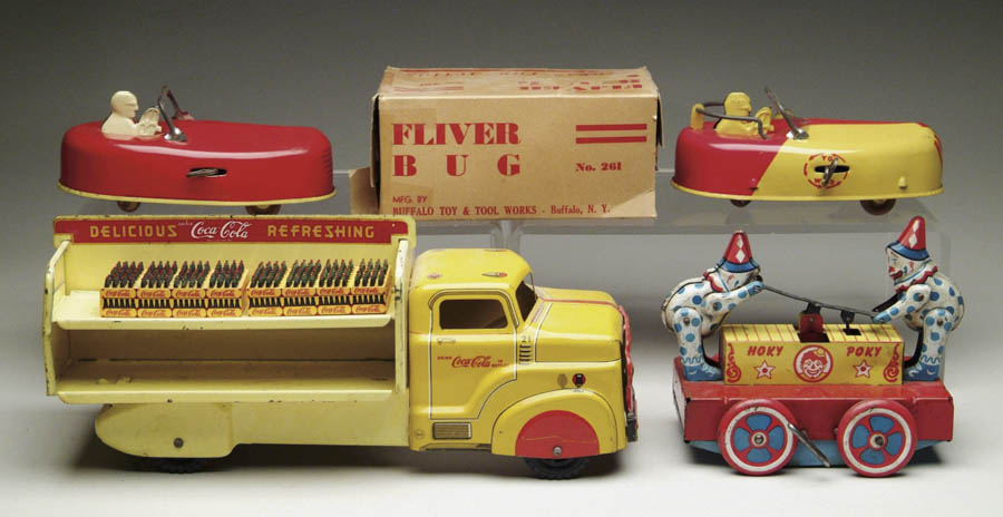 Appraisal: LOT OF FOUR TOY VEHICLES Including two Buffalo toy Flivver