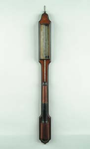 Appraisal: ANTIQUE SPOONER BAROMETER OF BOSTON MASSACHUSETTS Elongated form in walnut