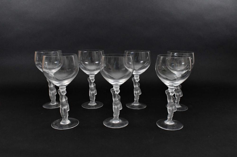 Appraisal: SEVEN LALIQUE STYLE PART FROSTED WINE GLASSESThe circular bowls raised