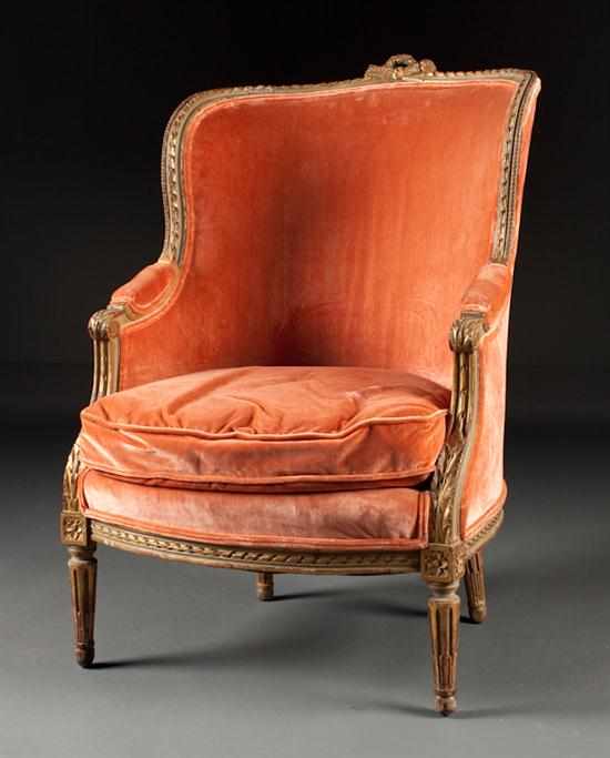 Appraisal: Louis XVI style painted parcel-giltwood upholstered bergere en cabriolet second