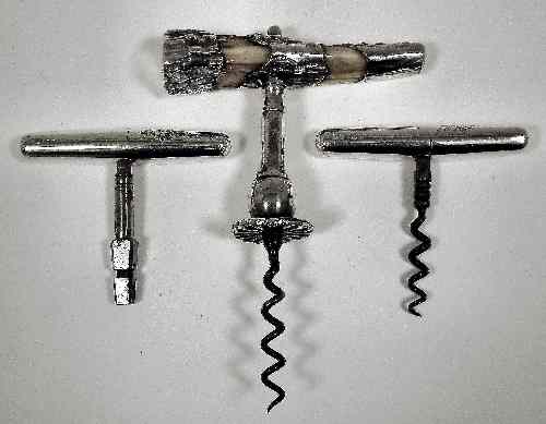 Appraisal: A Victorian silver folding corkscrew and matching carriage key ins