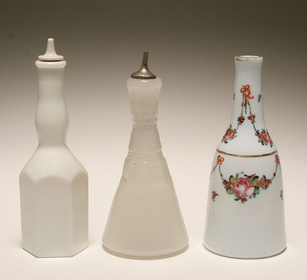 Appraisal: Three milk glass barber bottles one Koken-style one with hand