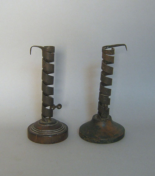 Appraisal: Two twist ejector candlesticks th c tallest - h