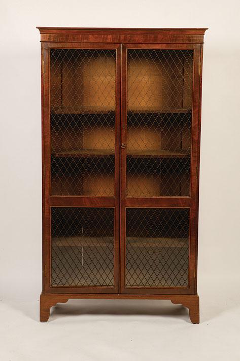 Appraisal: A SUITE OF THREE REGENCY STYLE MAHOGANY LIBRARY BOOKCASES with