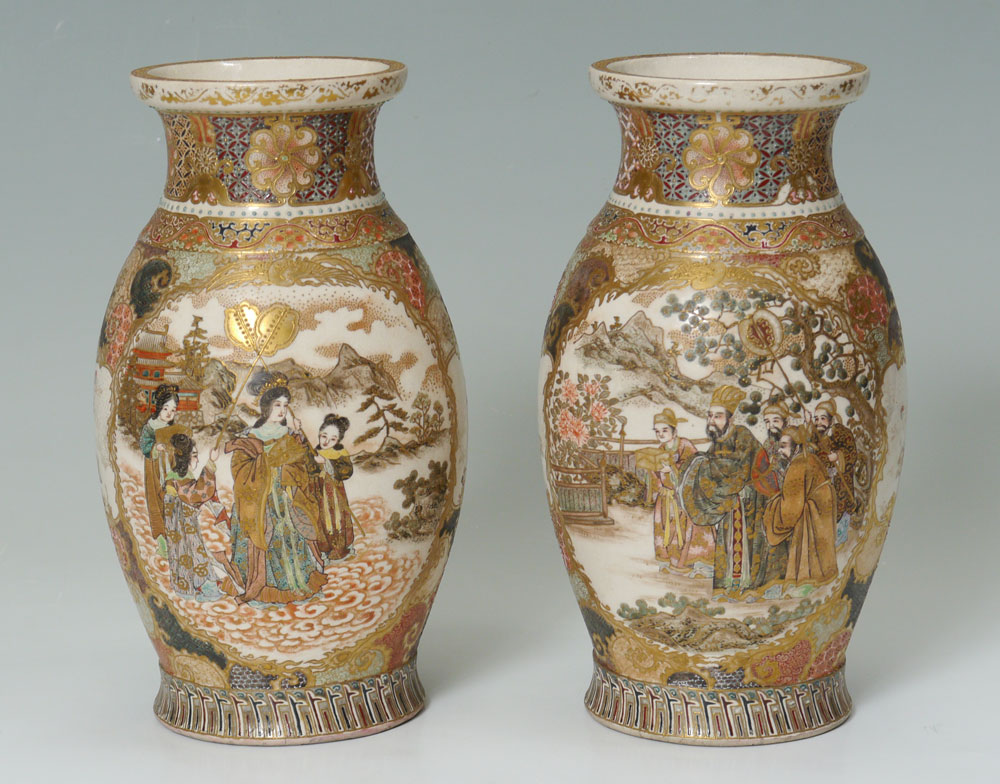 Appraisal: PAIR OF JAPANESE SATSUMA VASES Decorated with outdoor genre scenes