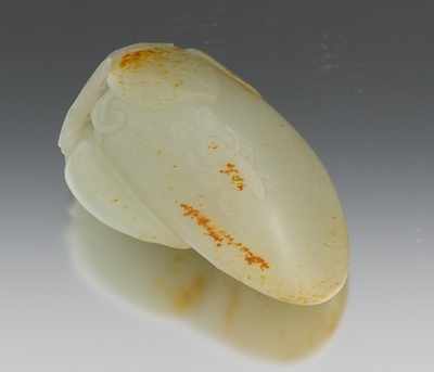 Appraisal: A Carved Jade Eggplant with Insect In a celadon color