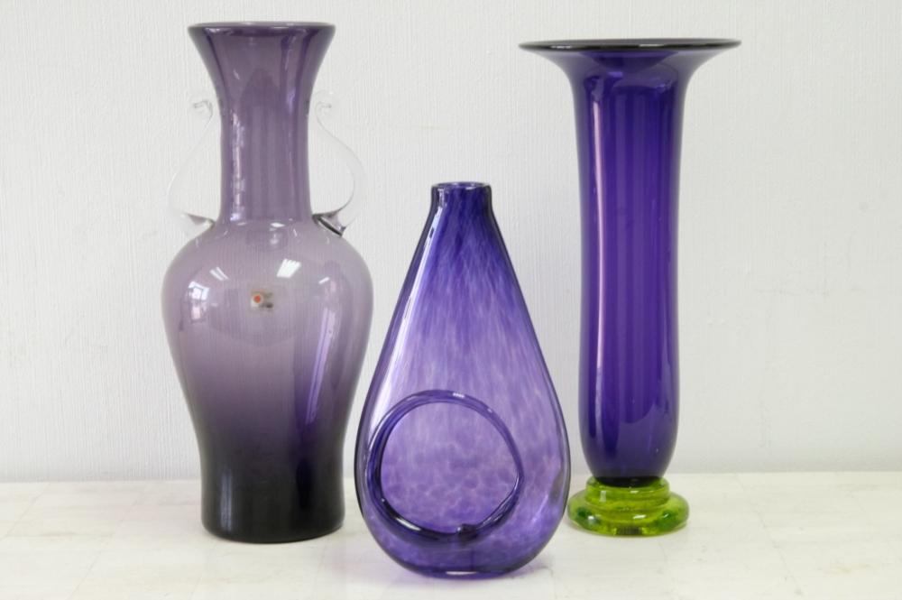 Appraisal: GROUP THREE AMETHYST ART GLASS VASESGroup of three purple amethyst